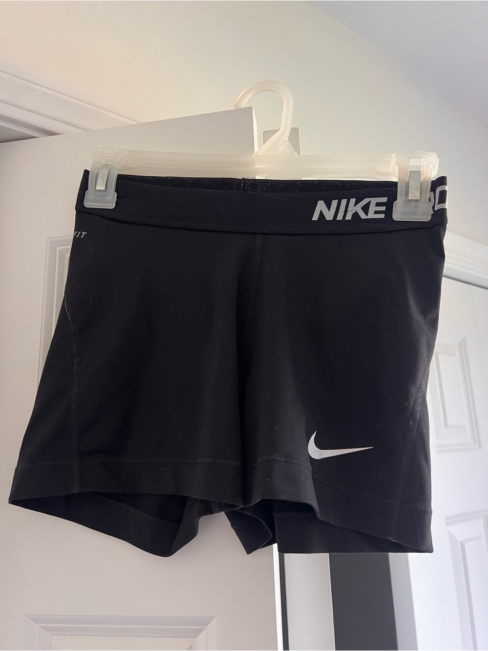 Nike Pros Black Athletic Shorts with White Swoosh